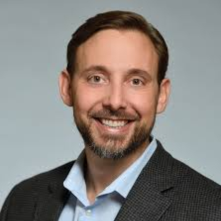 Travis Rieder Headshot