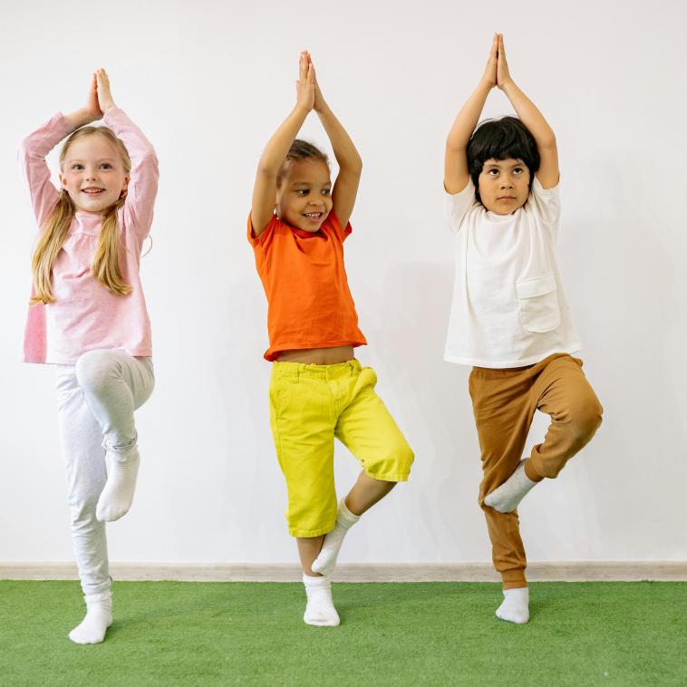 children balancing on one leg