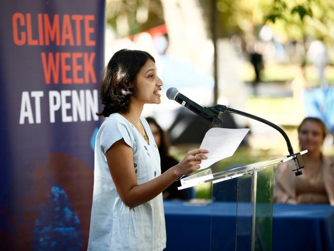 Person speaking into microphone