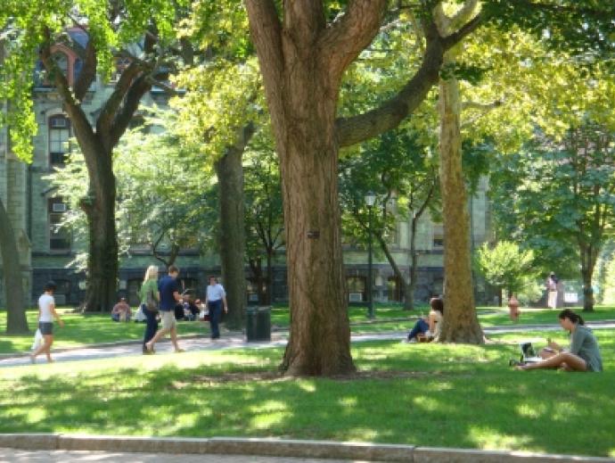 Students lounging and walking through College Green