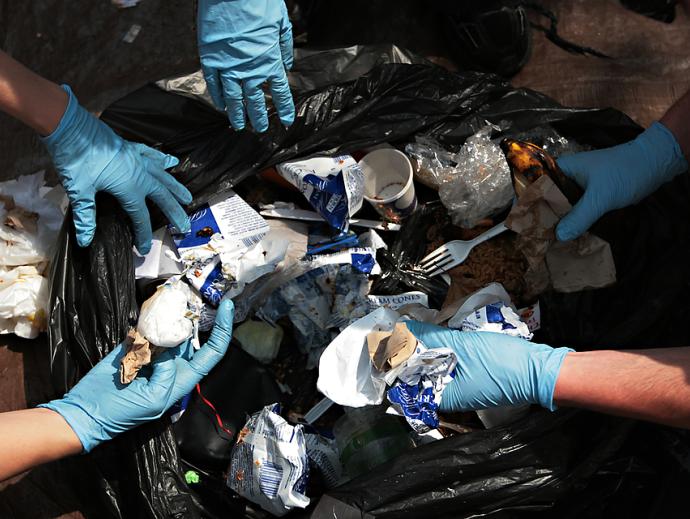 Picture of students sorting trash