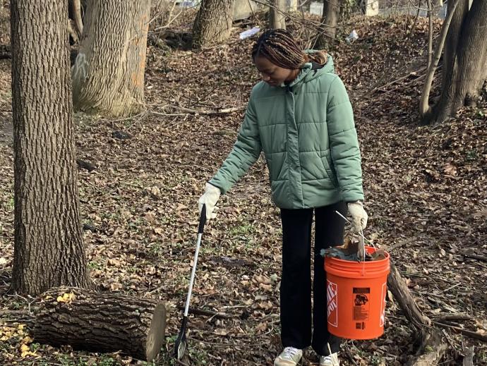 Person cleaning up trash